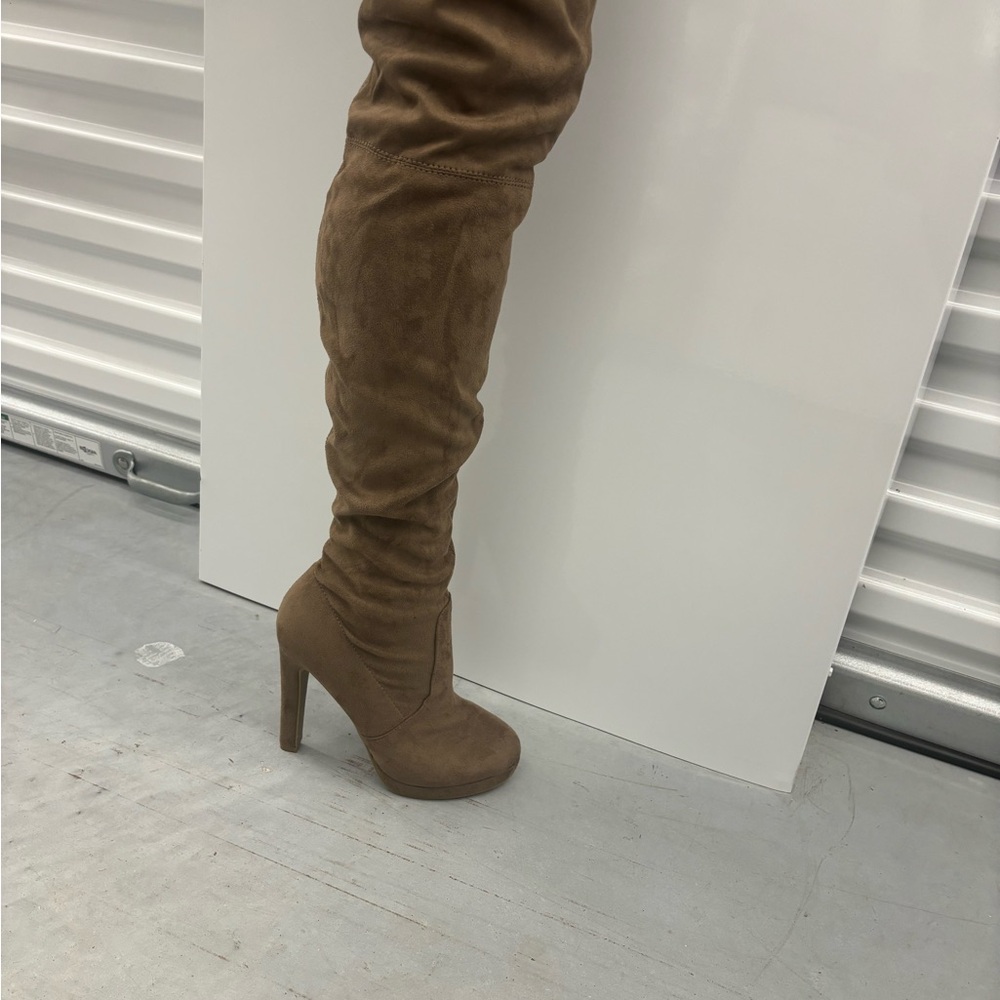 NEW knee high boots.